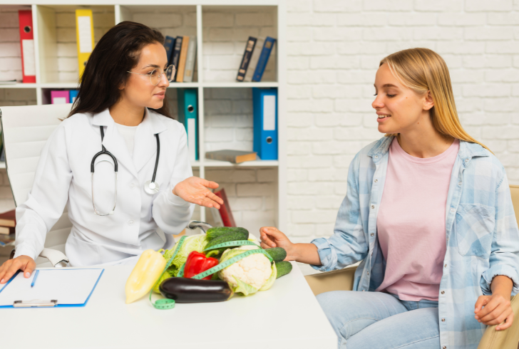 Dietitian advising patient on healthy meals