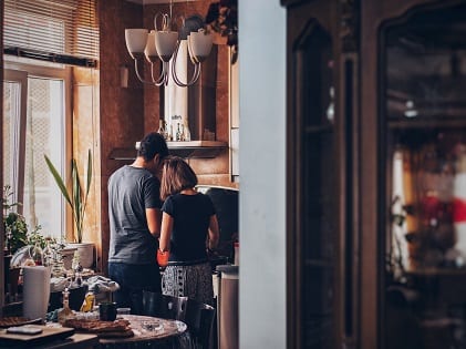 couple home kitchen