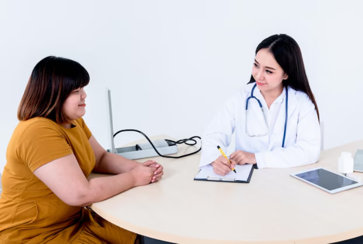 Doctor advising patient about health